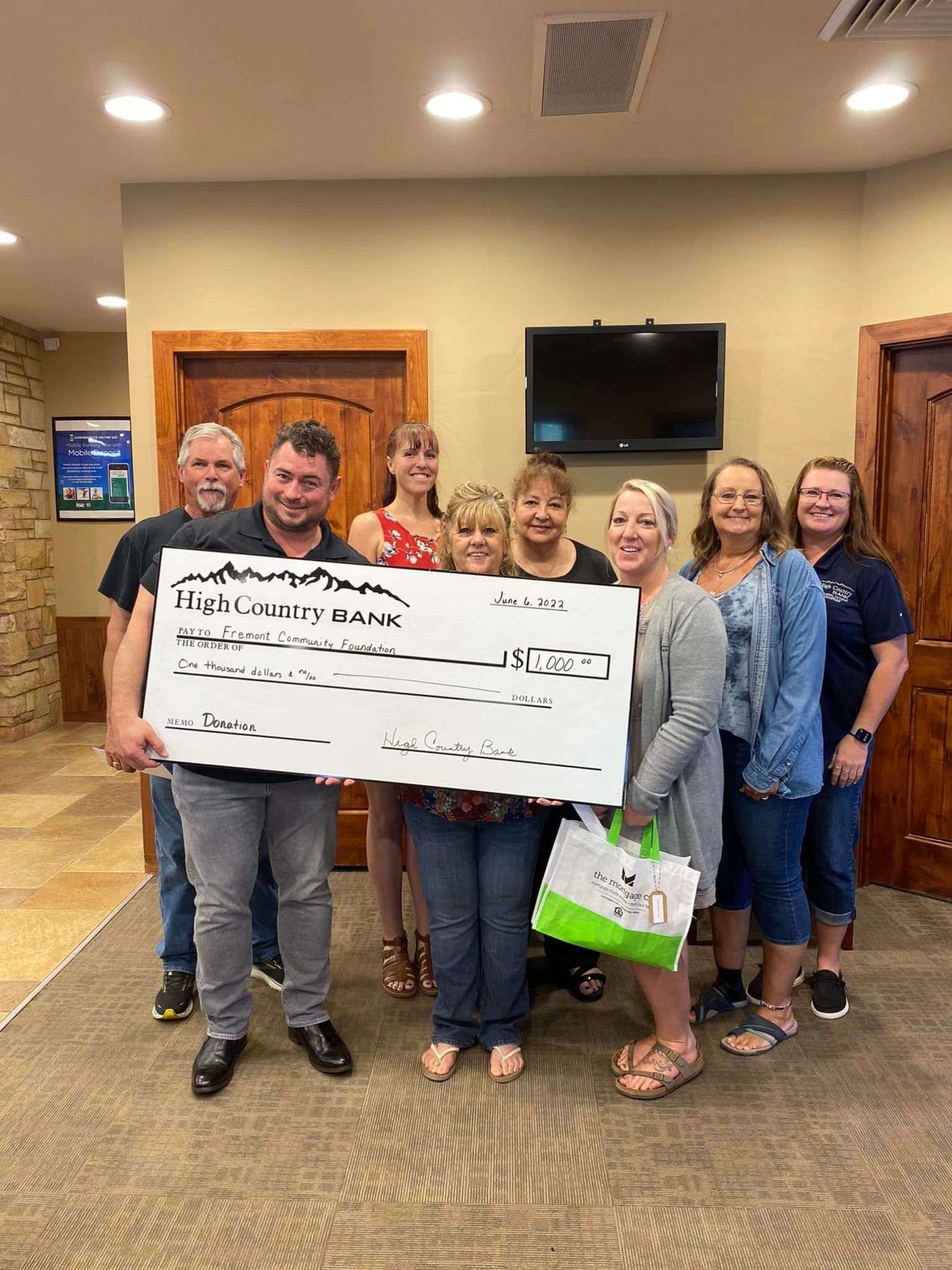 Community members presenting a donation to FCF